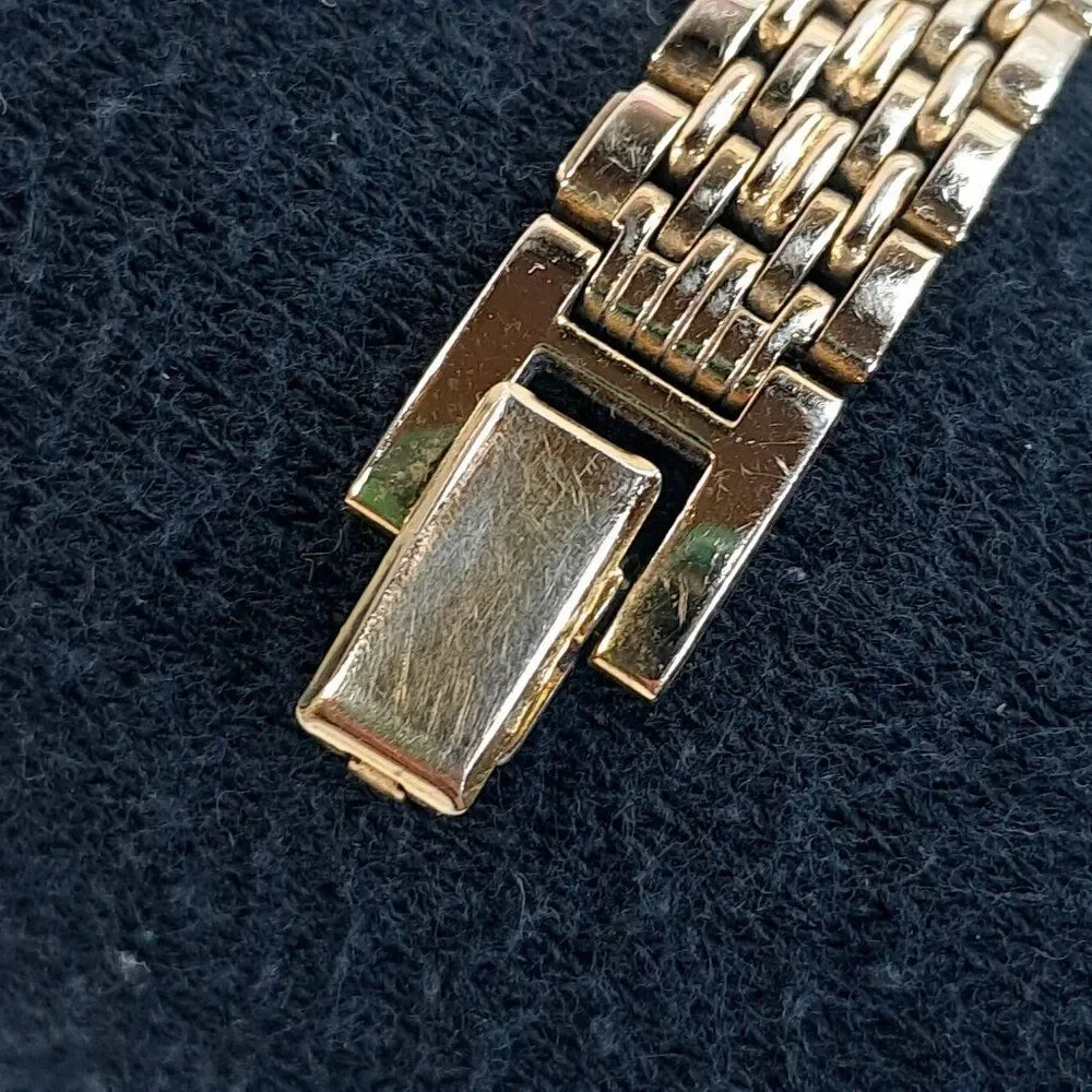 Vintage Seiko Watch Women Gold Tone Gold Dial Rectangle bracelet 2E20-7023 dress